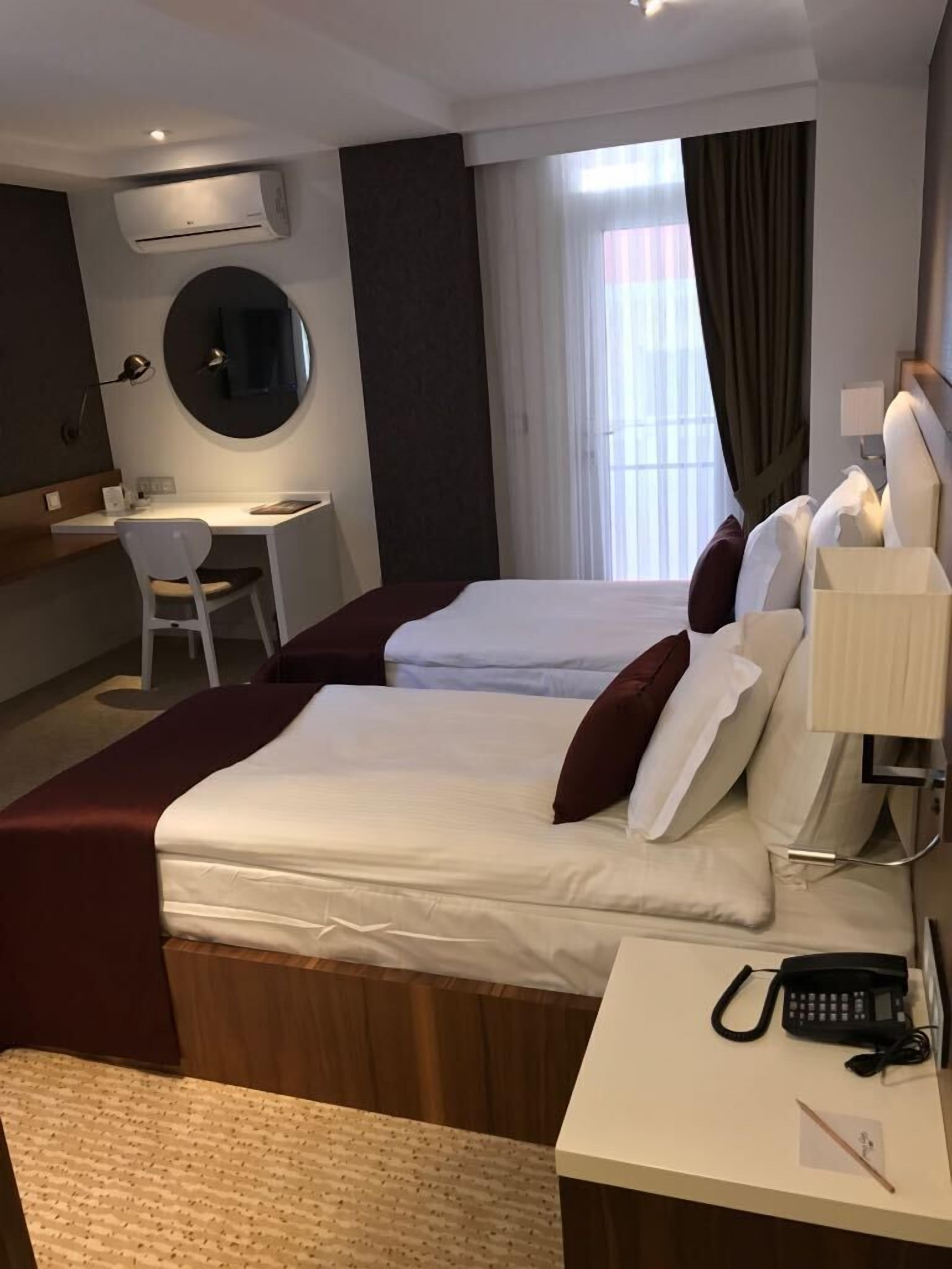 business twin room | premium bedding, free minibar items, in-room safe, desk