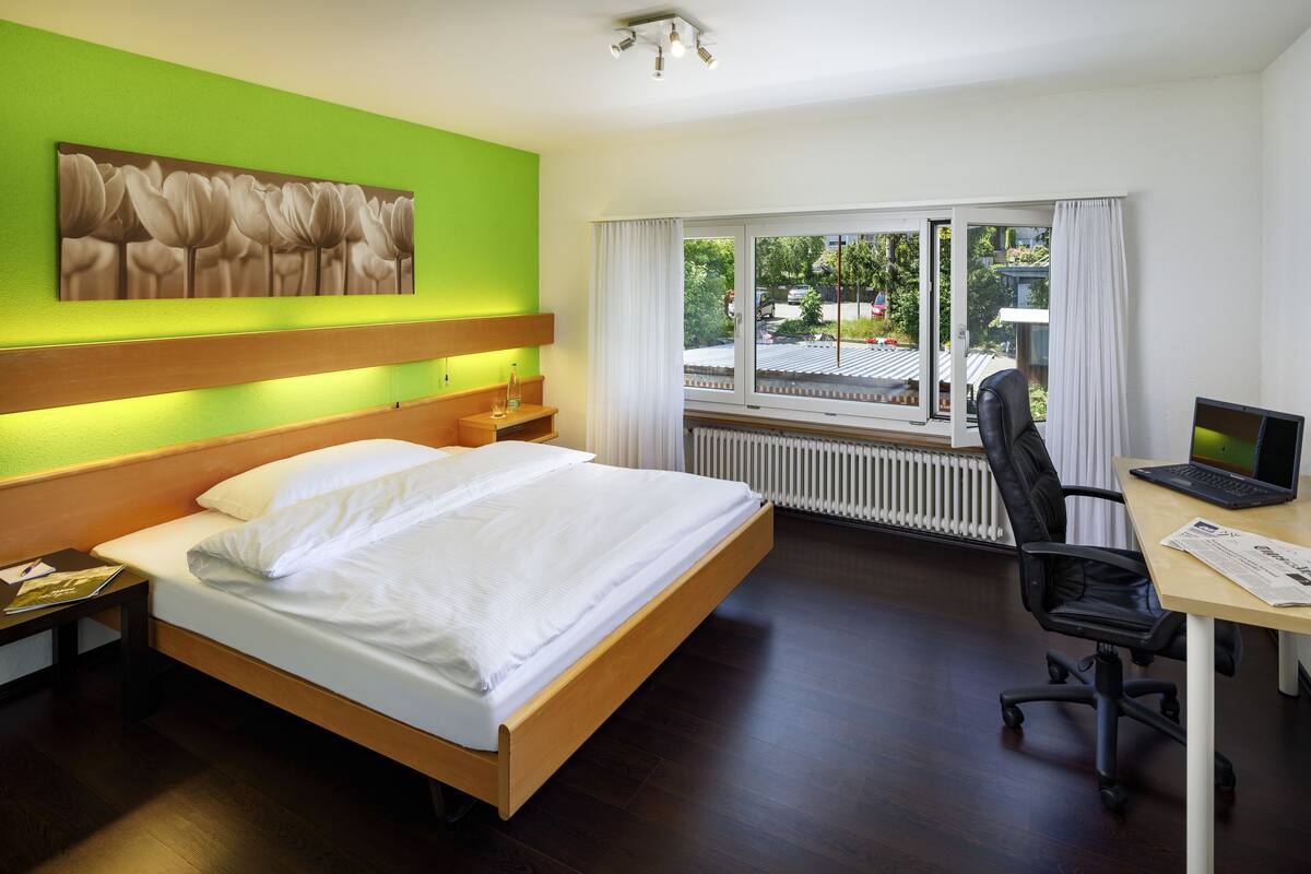 Budget Single Room (No Elevator) | Premium bedding, in-room safe, desk, blackout drapes