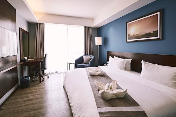 Premier Double Room, City View | Minibar, in-room safe, desk, blackout drapes