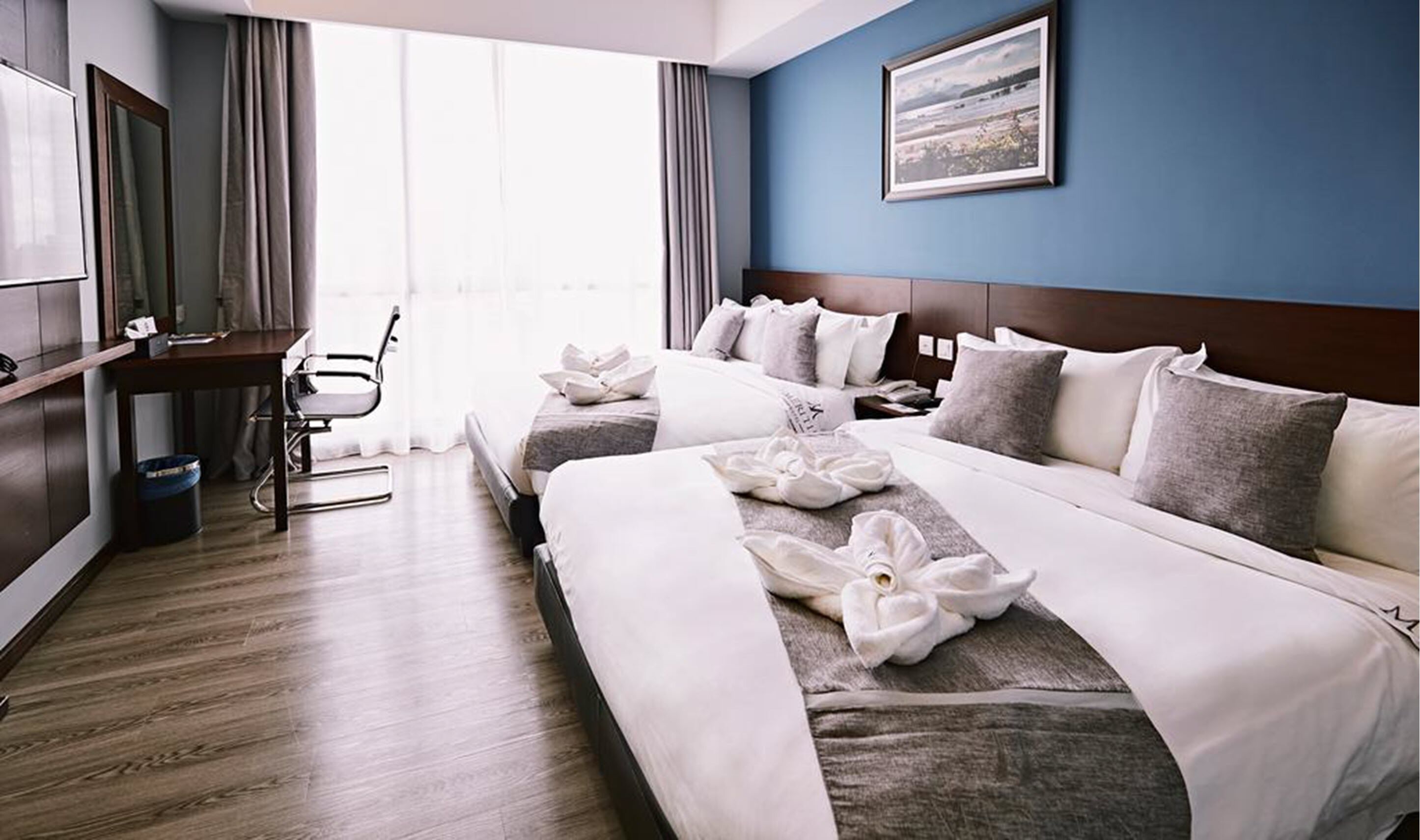 family room, 2 queen beds | minibar, in-room safe, desk, blackout curtains