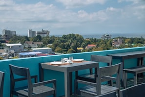 Breakfast, lunch, dinner served; local and international cuisine