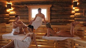 A sauna with wooden benches and a log cabin interior. - Seeresidenz Klink (Klink)