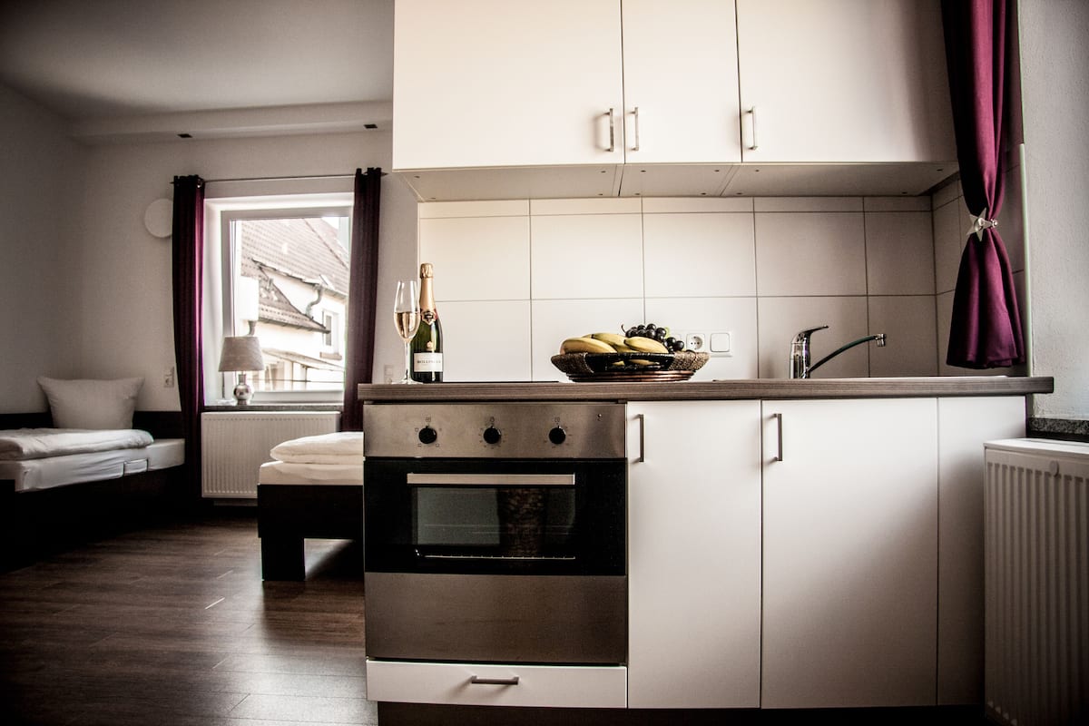 comfort studio | private kitchen | stovetop, coffee/tea maker, electric kettle, cookware/dishes/utensils