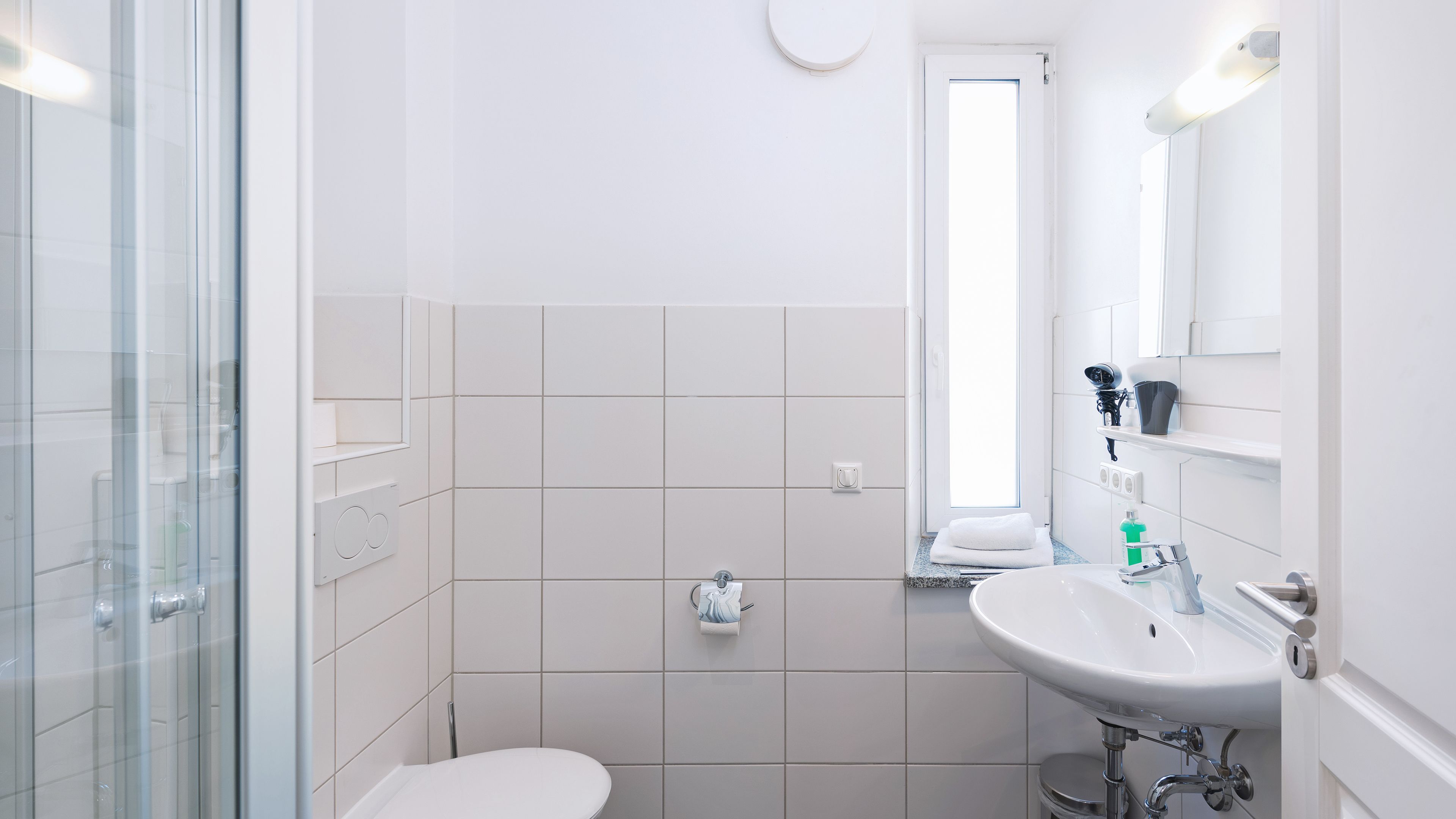 basic studio | bathroom | shower, free toiletries, hair dryer, towels