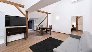 Comfort Apartment | Living area | Flat-screen TV