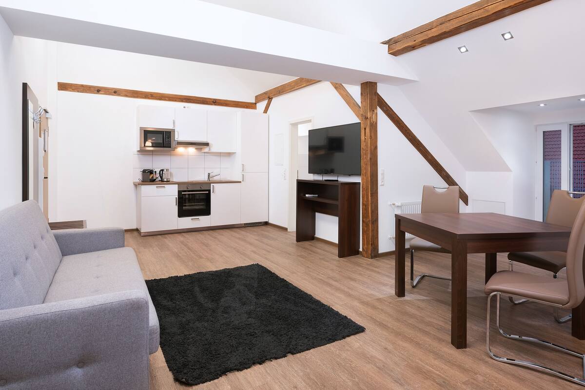 comfort apartment | living area | flat-screen tv