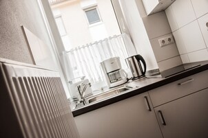 Placa de cocina, cafetera/tetera, tetera/pava eléctrica