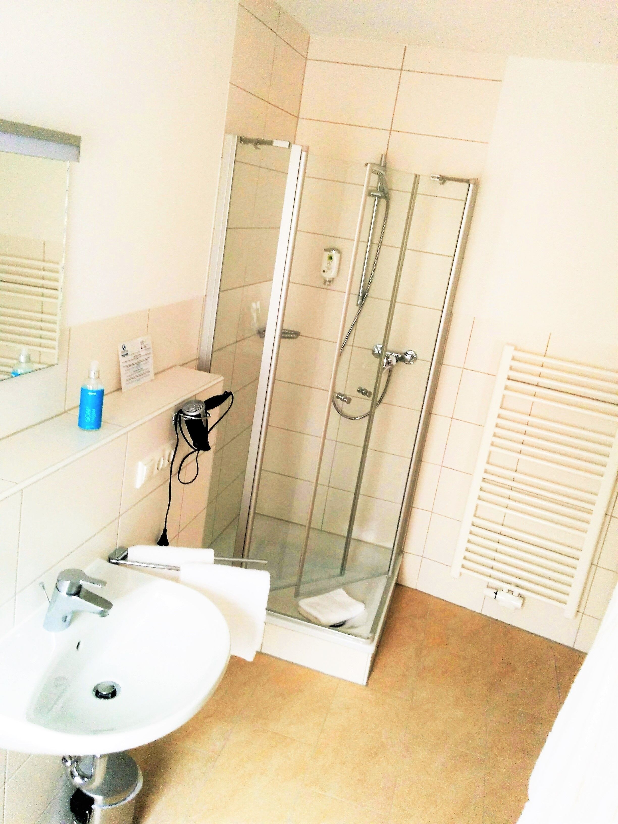 standard studio | bathroom | shower, free toiletries, hair dryer, towels