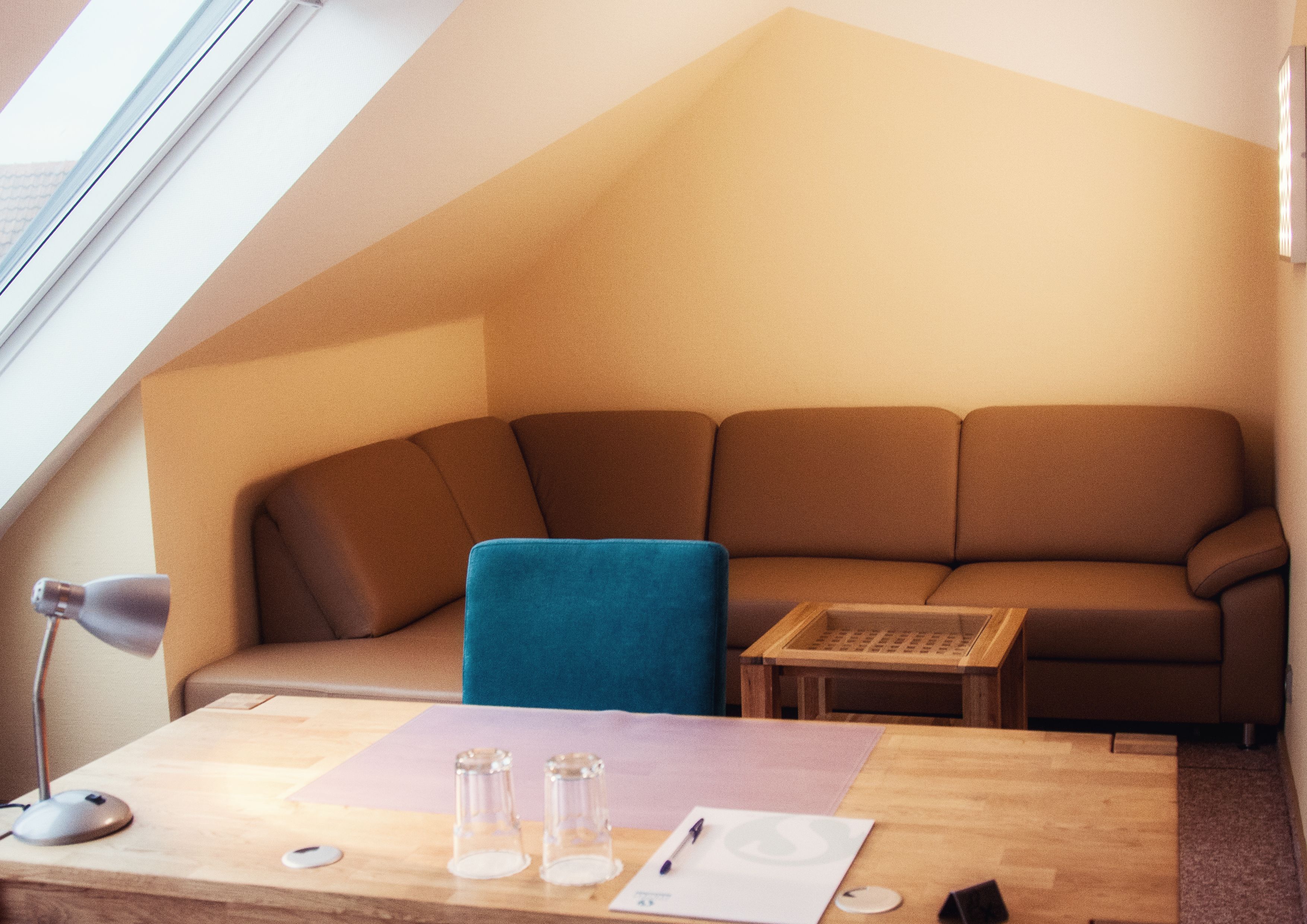 classic triple room | living area | flat-screen tv