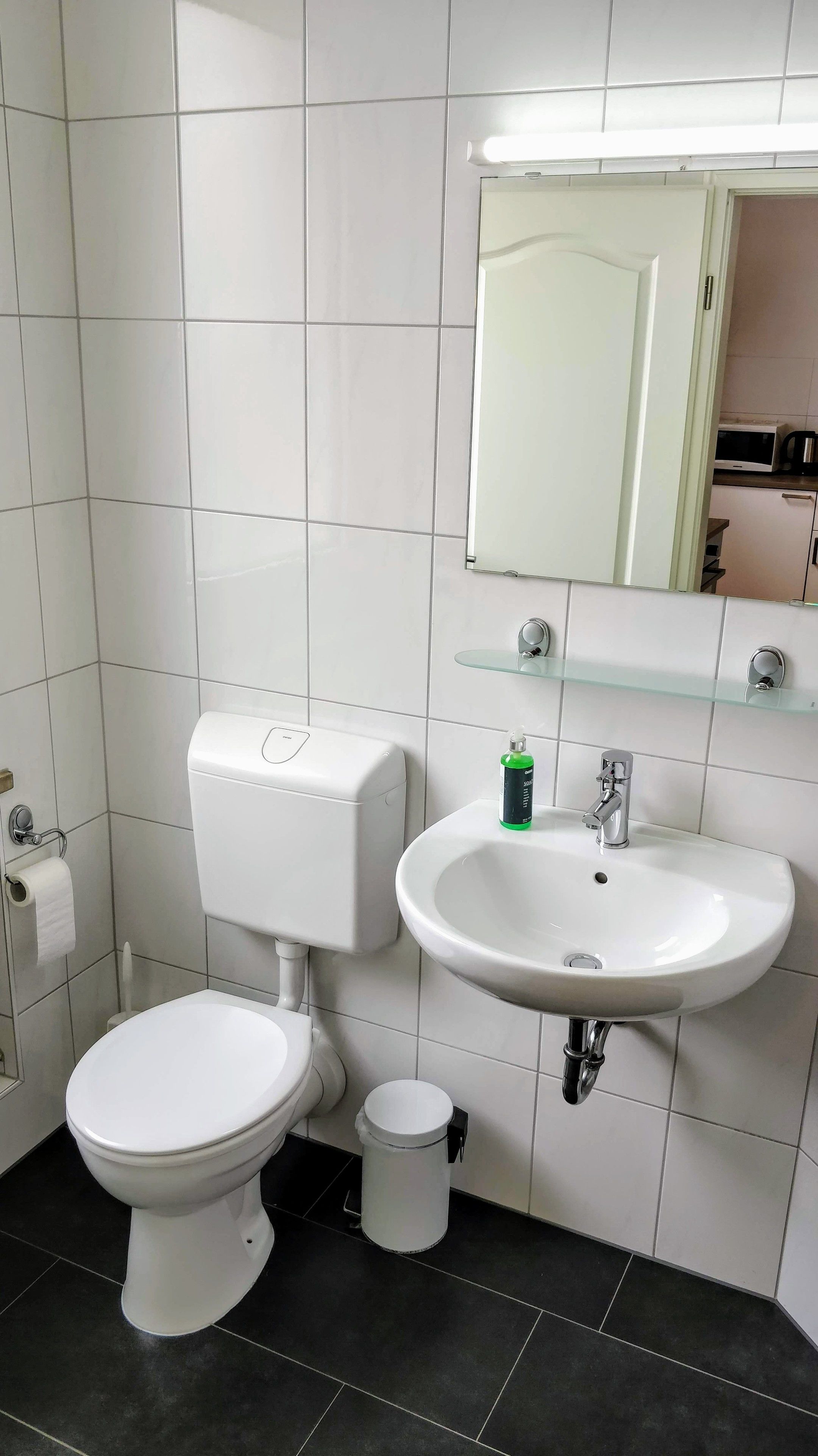 economy studio | bathroom | shower, hair dryer, towels, soap