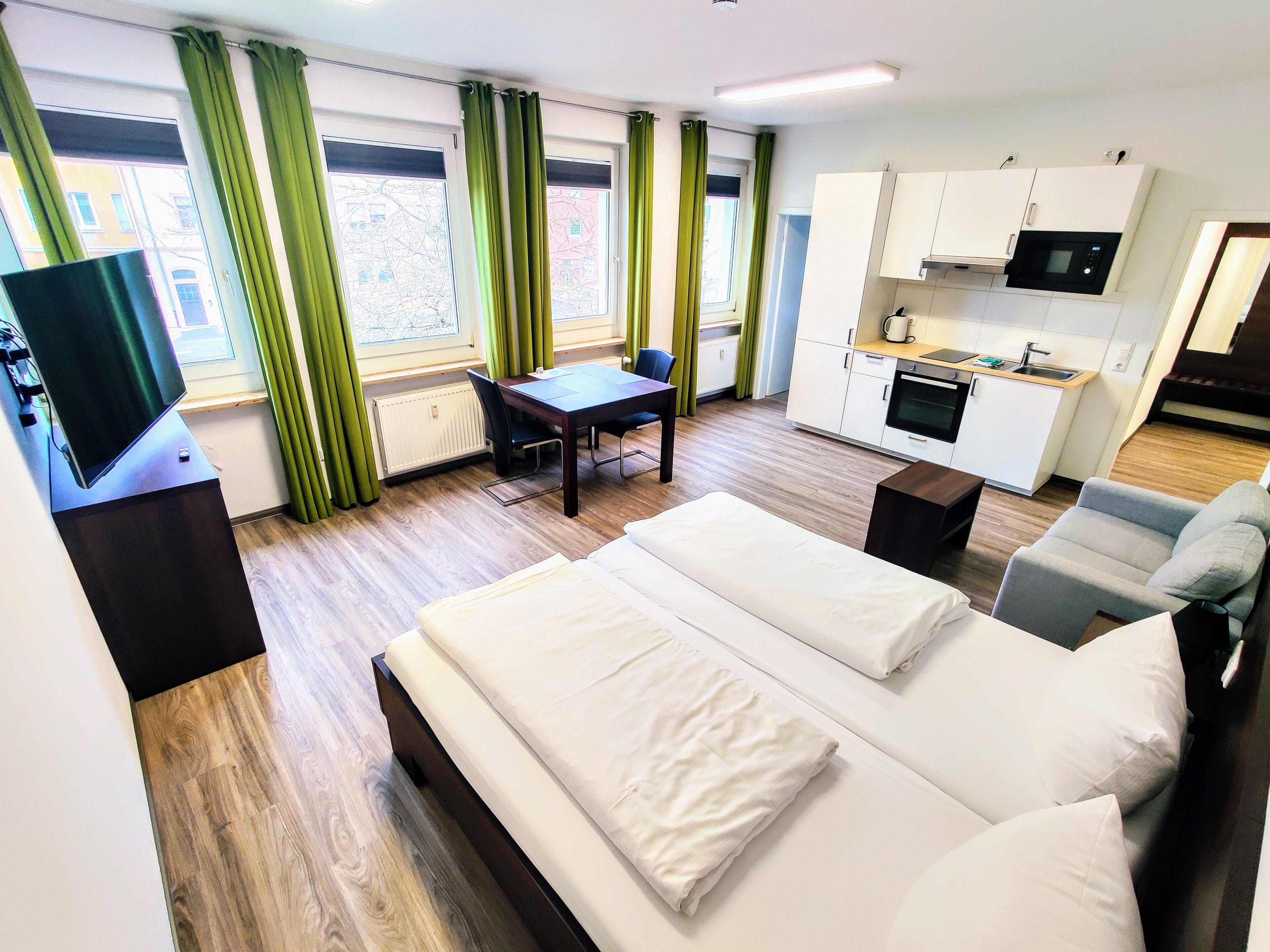 Estudio Confort | Área de sala de estar | Televisión de pantalla plana 