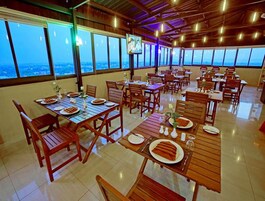 Breakfast, lunch, dinner served; local and international cuisine 