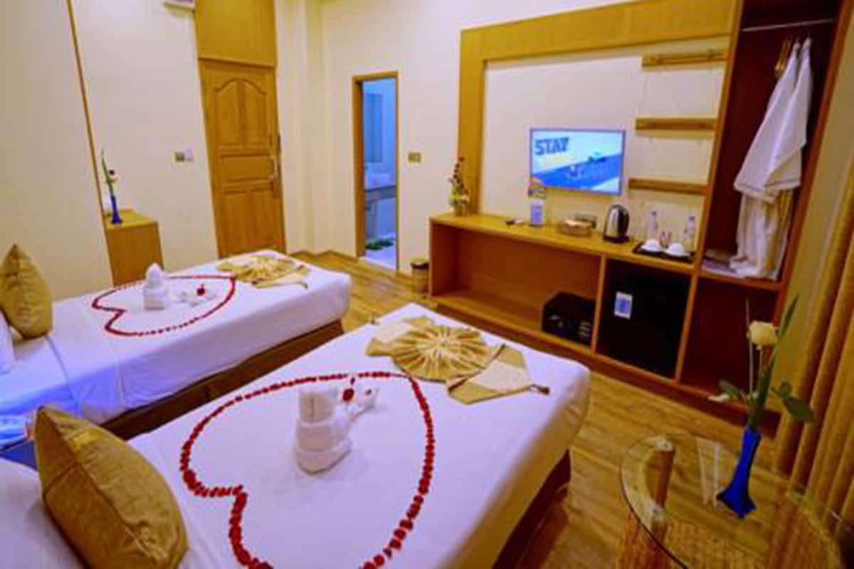 Ropa de cama de alta calidad y minibar 