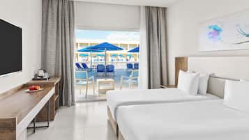 Habitación superior | 1 habitación, minibar, caja de seguridad en la habitación y escritorio