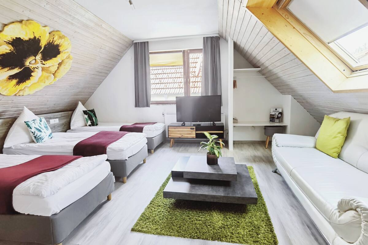 comfort quadruple room, multiple beds | 1 bedroom, premium bedding, desk, blackout curtains