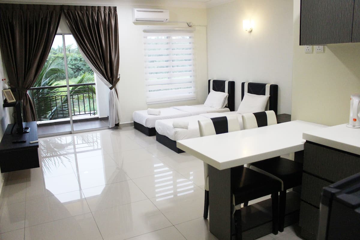 Family Suite, 1 Bedroom | Blackout curtains, iron/ironing board, free WiFi