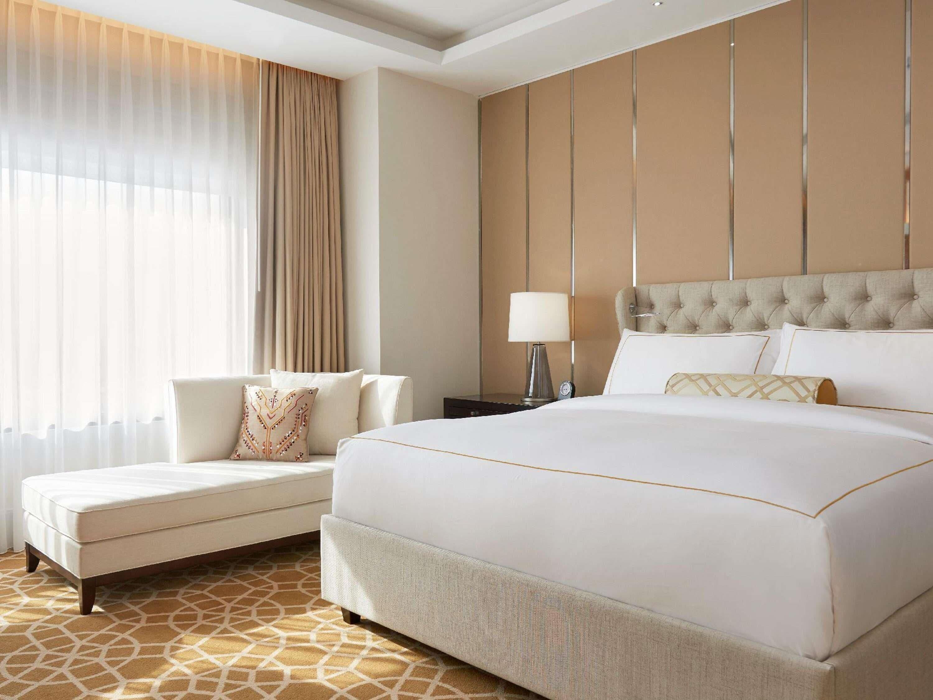 Premium bedding, down comforters, minibar, in-room safe