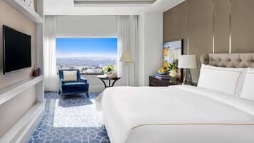 Premium bedding, down comforters, minibar, in-room safe