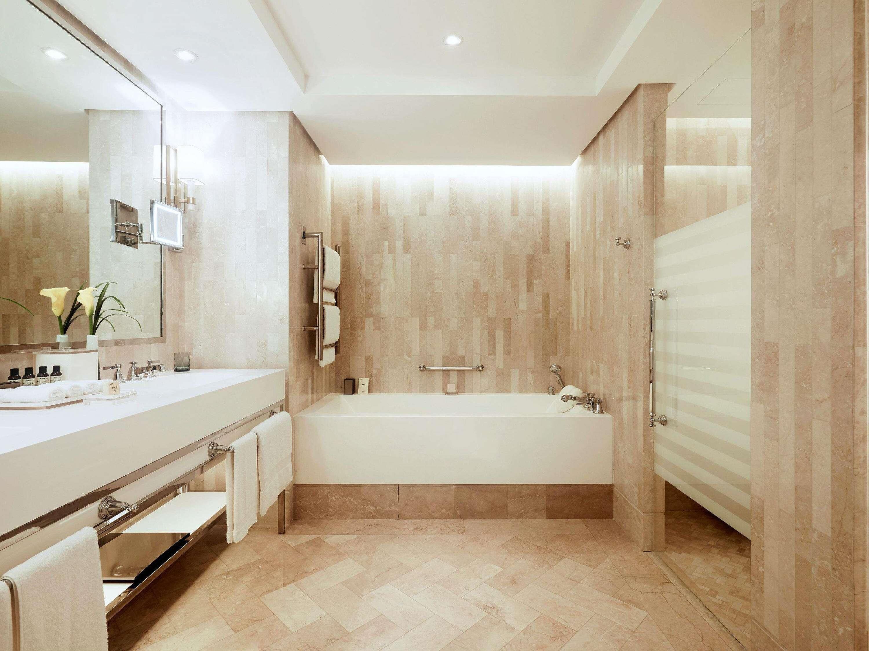 Premium bedding, down comforters, minibar, in-room safe