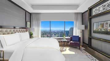 Suite presidencial (Signature) | Ropa de cama de alta calidad, edredones de plumas, minibar y caja fuerte