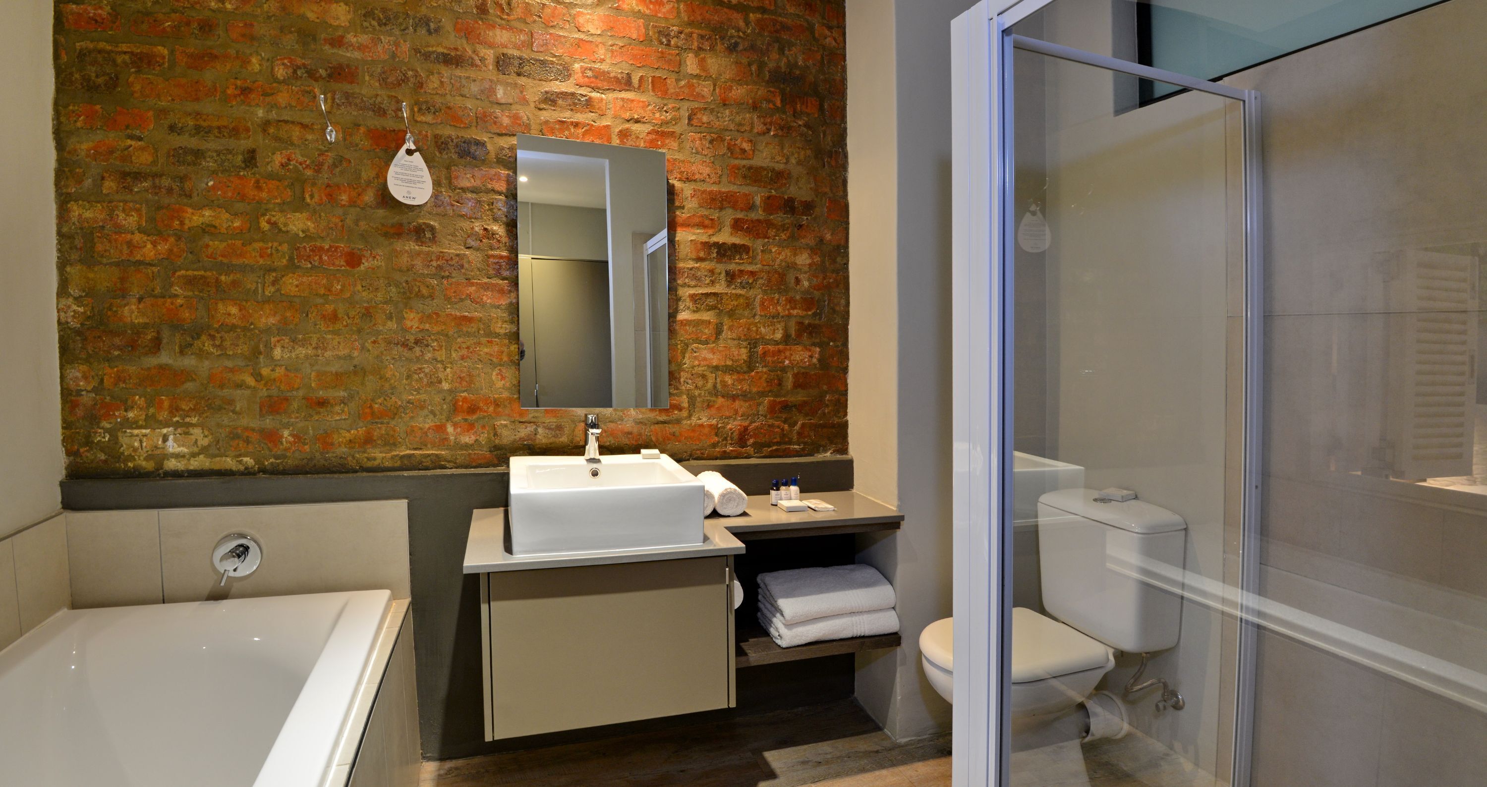 separate bathtub and shower, deep-soaking bathtub, free toiletries