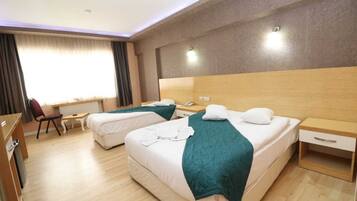 Classic Twin Room, 1 Bedroom | 1 bedroom, free minibar, desk, iron/ironing board