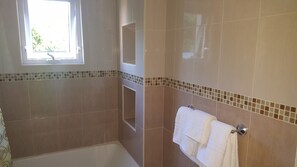 Apt 10, Executive Suites - Palms of Ottawa | Bathroom | Combined shower/tub, deep soaking tub, free toiletries, hair dryer