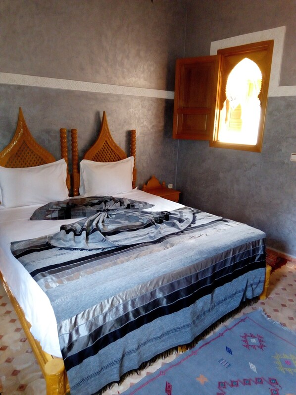 Premium bedding, desk, blackout curtains, soundproofing