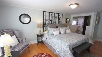 Suite, 1 King Bed, Kitchenette, Garden Area | Iron/ironing board, free WiFi