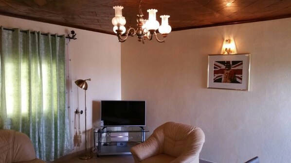 Flat-screen TV, pay movies
