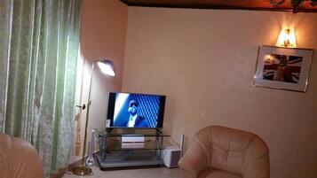 Flat-screen TV, pay movies