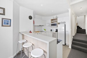 Penthouse, 2 Bedrooms | Private kitchen | Full-size fridge, microwave, oven, stovetop