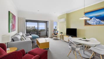 Penthouse, 2 Bedrooms | Living area | Flat-screen TV, DVD player, MP3 dock