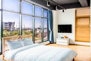 Habitación superior con 2 camas individuales | Sistema de insonorización y wifi gratis