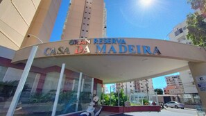 The entrance of Casa da Madeira with a clear view of the building's facade and surrounding area.