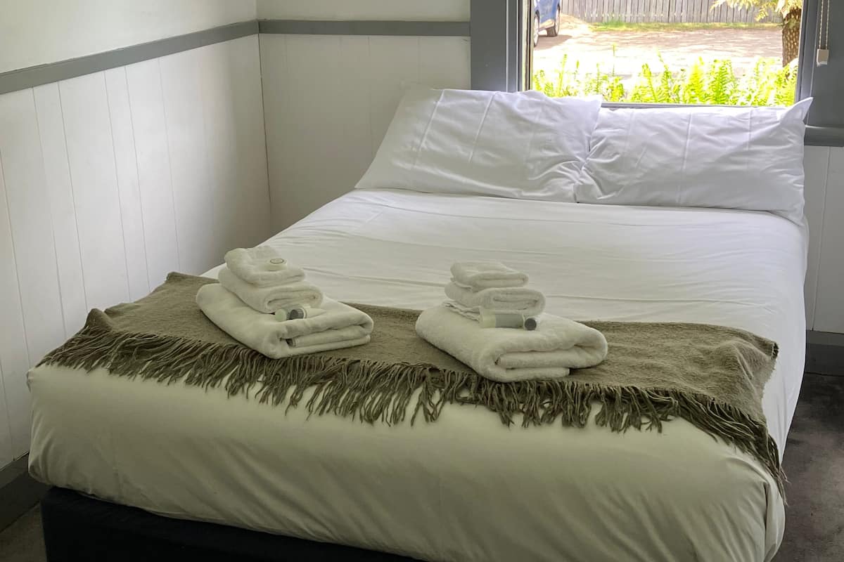 queen room  | iron/ironing board, bed sheets