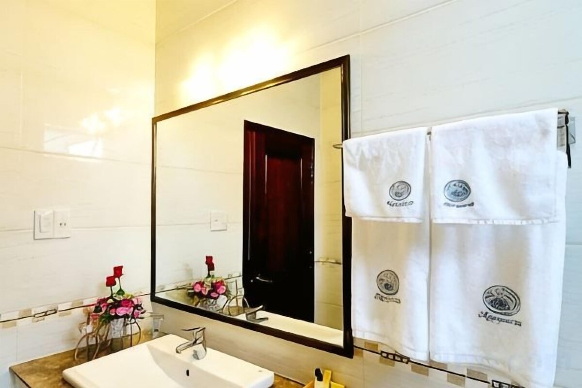 Bathroom | Shower, free toiletries, hair dryer, slippers