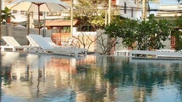 Outdoor pool, pool umbrellas, sun loungers