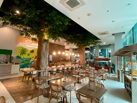 Breakfast, lunch, dinner served; local and international cuisine