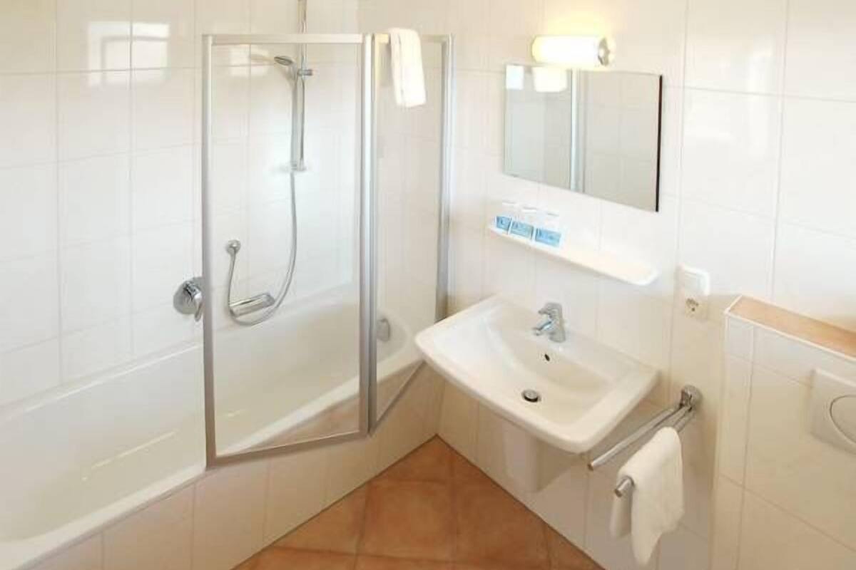 family room, 1 bedroom, balcony, mountain view | bathroom | free toiletries, hair dryer, towels