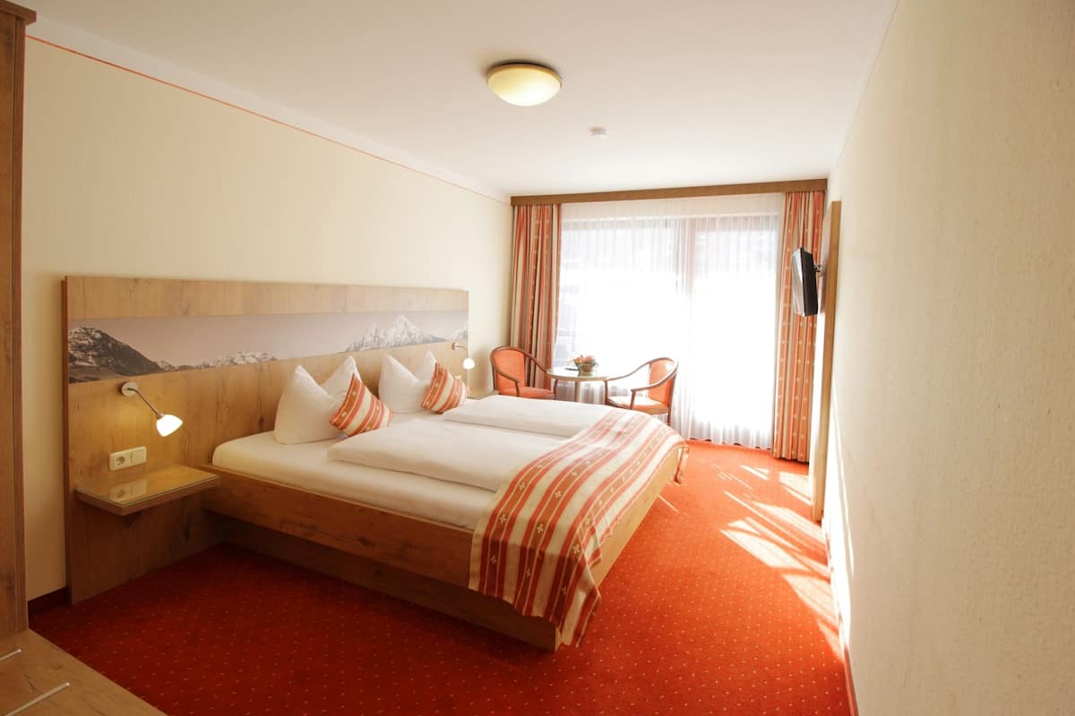 standard double room, mountain view | in-room safe, desk, blackout curtains, cots/infant beds