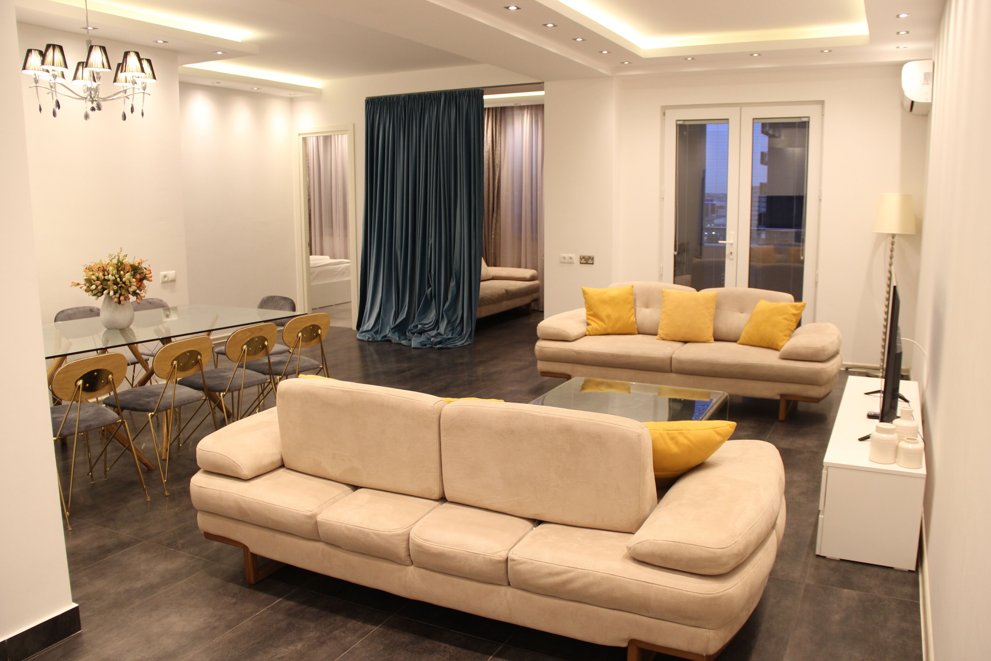 superior suite, 4 bedrooms, balcony | living area | flat-screen tv