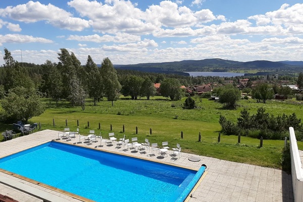 Seasonal outdoor pool, open 9:00 AM to 9:00 PM, pool umbrellas