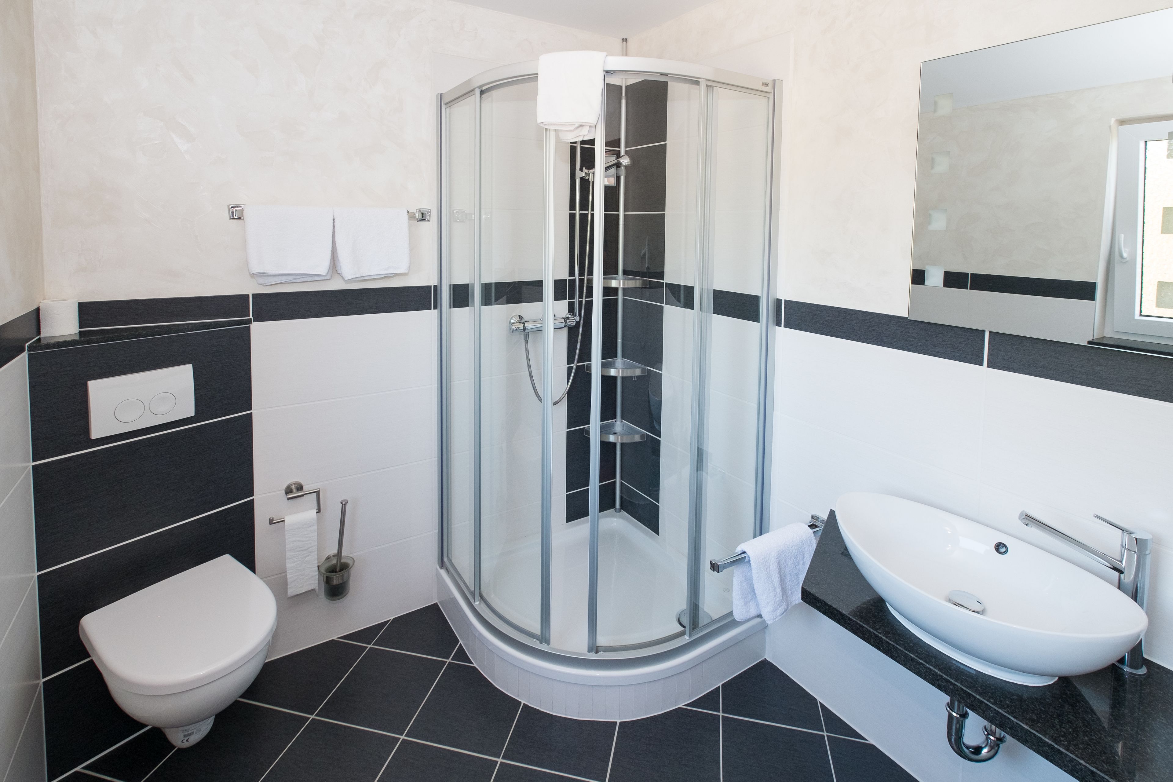 family room | bathroom | shower, free toiletries, hair dryer, towels