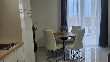 Classic Apartment, 2 Bedrooms, Balcony, Garden Area | Living area | Flat-screen TV