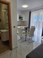 Classic Apartment, 1 Bedroom, Terrace, Garden Area | Living area | Flat-screen TV