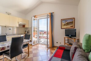 Classic Apartment, 1 Bedroom, Balcony, Garden Area | Living area | Flat-screen TV - Apartments Mary (Trogir)