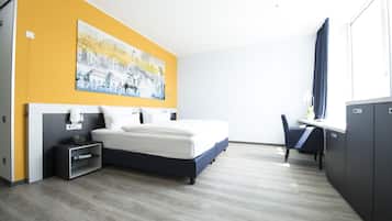 Een kluis op de kamer, een bureau, geluiddichte muren, gratis wifi