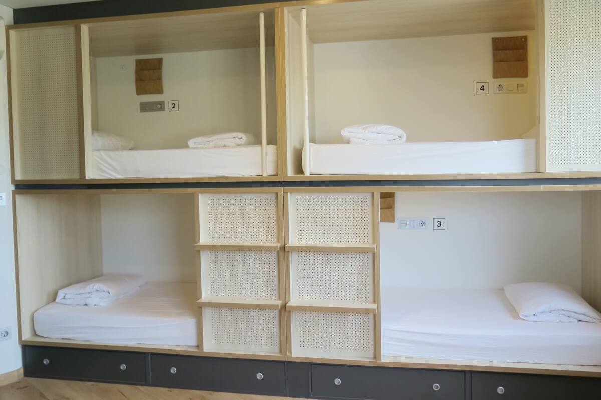 Blackout curtains, soundproofing, free WiFi, bed sheets