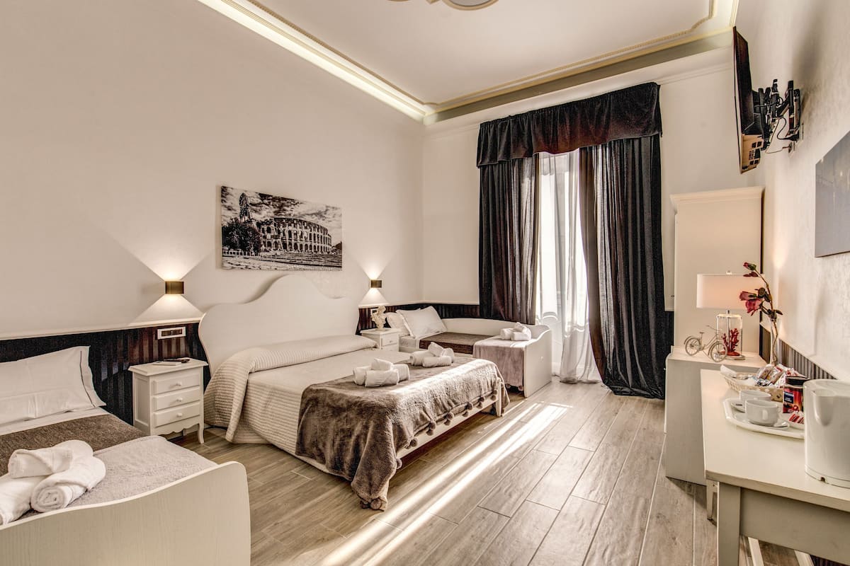 Deluxe Quadruple Room, Multiple Beds | Egyptian cotton sheets, premium bedding, down comforters
